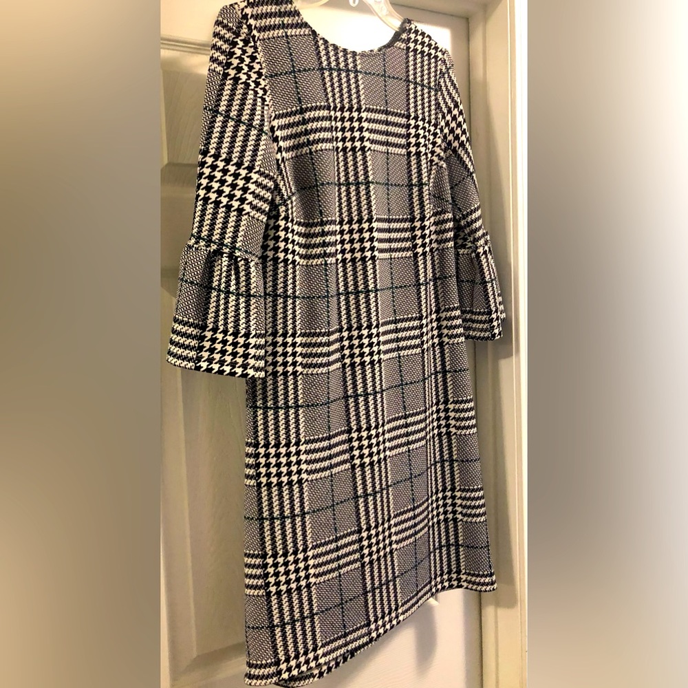Small black and white herringbone pattern dress with dark green lines.